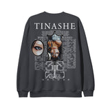 image of the back of a crewneck sweatshirt on a white background. back of crewneck has a full back print in white that says tinashe at the top across the shoulders, below are two photos of tinashe surrounded by song lyrics for this is for my tribe.