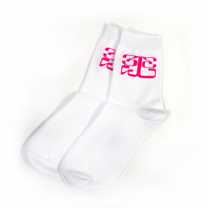 Image of white socks against a white background. The top of the socks feature the tinashe 333 logo in pink. The logo is a 3 facing the right way, mirrored by a 3 facing the opposite way, connected to a large 3 that is sideways and across the bottom of the other two 3's, forming a square shaped logo.