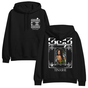 Photo of front and back of the black Tinashe 333 hooded sweatshirt.  Front has white flower pattern and "Tinashe" on left chest area.  Back has "333 logo and "Tinashe" in white and features a color print of Tinashe wearing a revealing gold outfit.